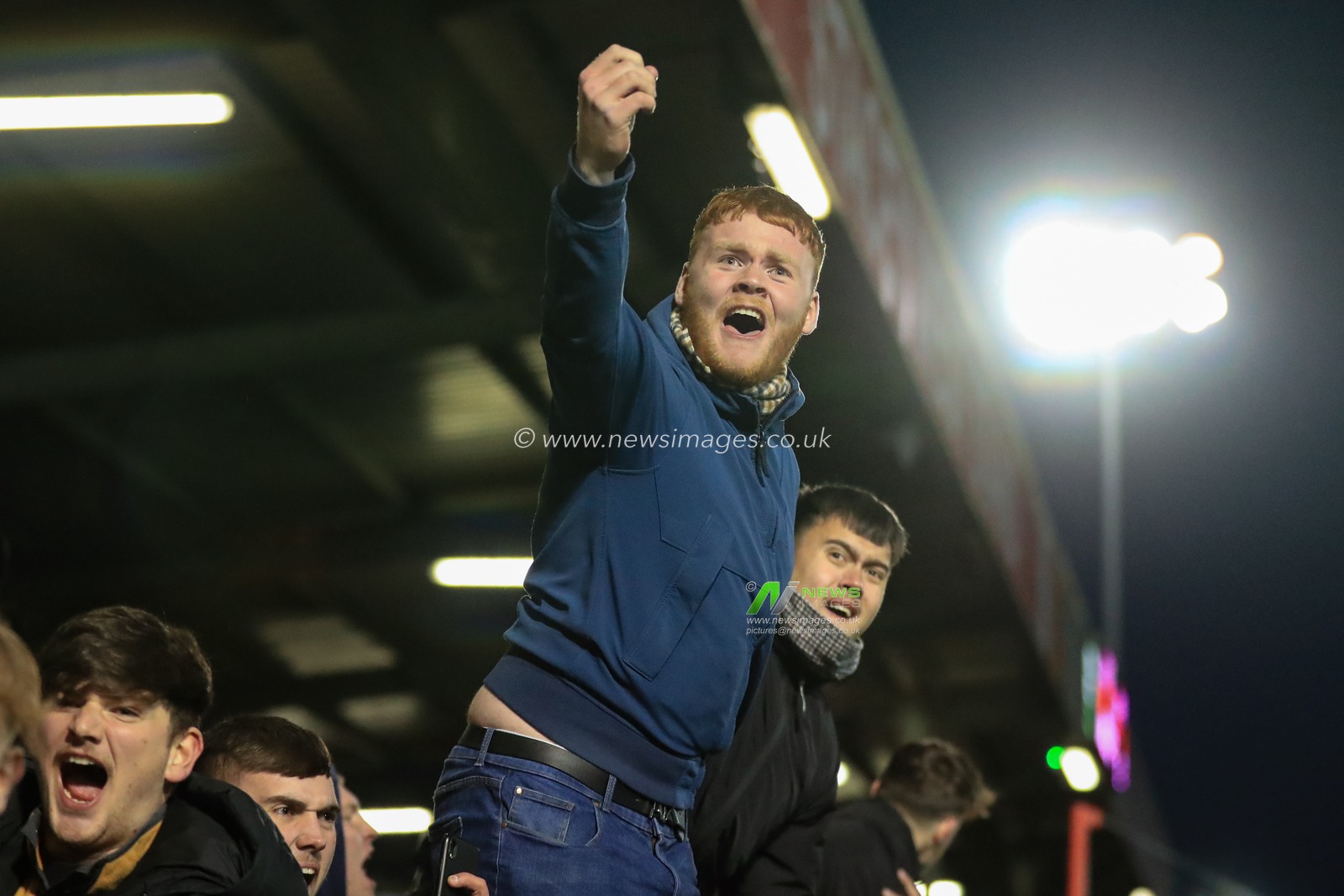 Barnsley fans celebrate Barnsleyâ€™s second goal to make it 1-2 during the Sky Bet League 1 match Lincoln City vs Barnsley at Gelder Group Sincil Bank Stadium, Lincoln, United Kingdom, 25th November 2023

(Photo by Alfie Cosgrove/News Images)