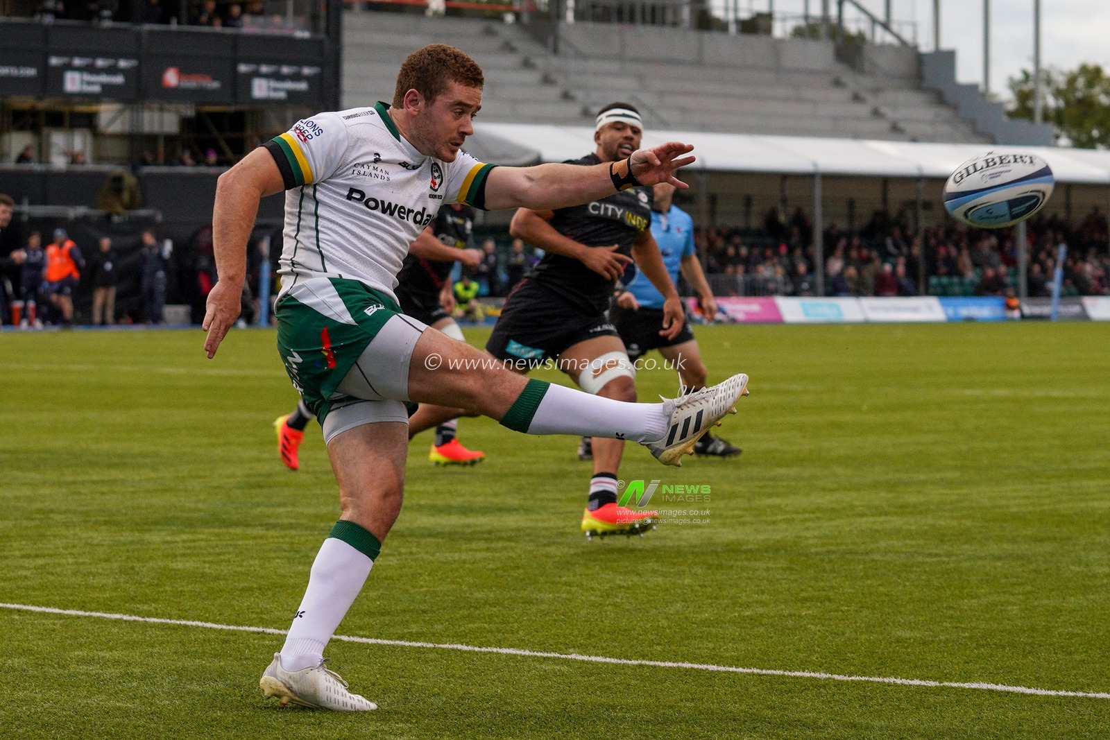 Paddy Jackson #10 of London Irish kicks the ball upfield