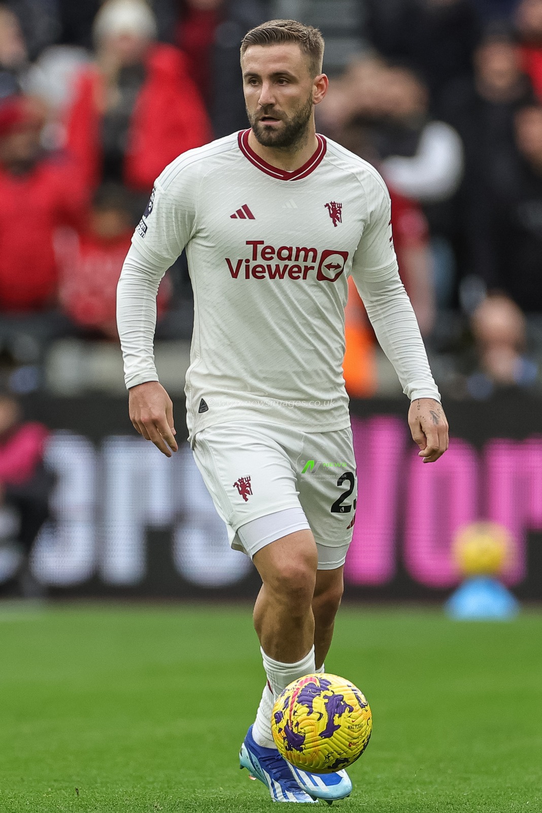 Luke Shaw of Manchester United with the ball during the Premier League match West Ham United vs Manchester United at London Stadium, London, United Kingdom, 23rd December 2023

(Photo by Mark Cosgrove/News Images)