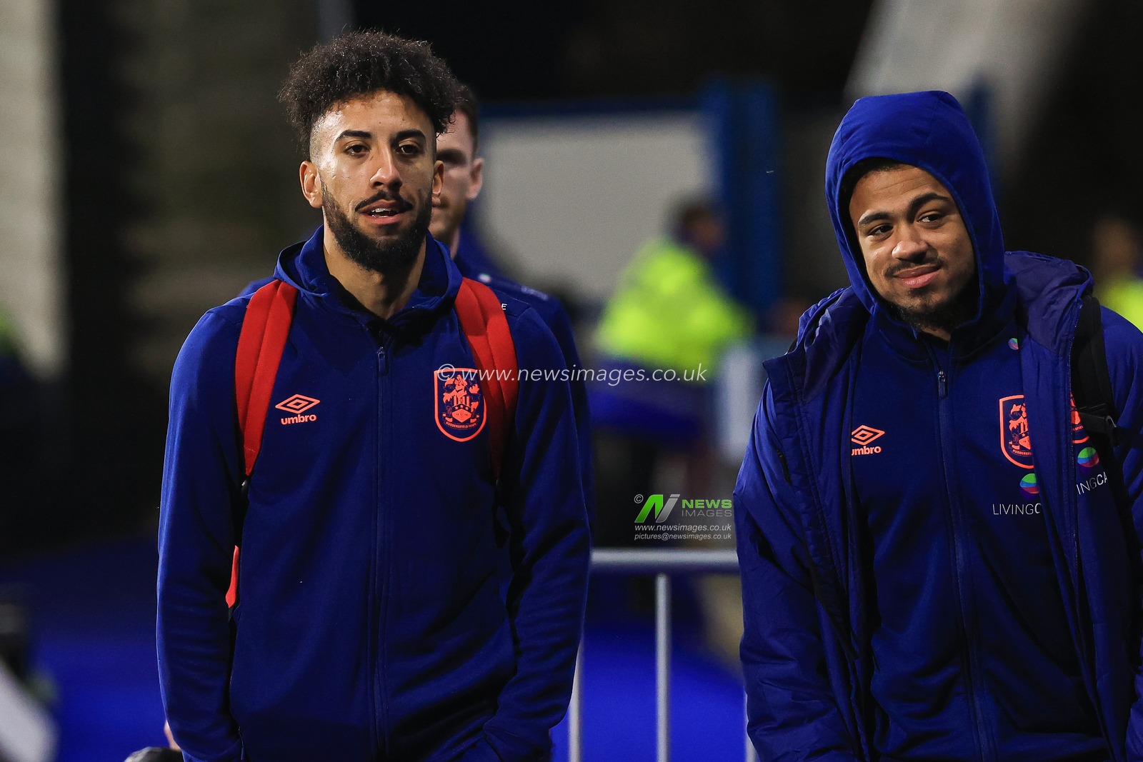 Sorba Thomas #16 and Josh Koroma #10 of Huddersfield Town arrive at The John Smith's Stadium, ahead of the game