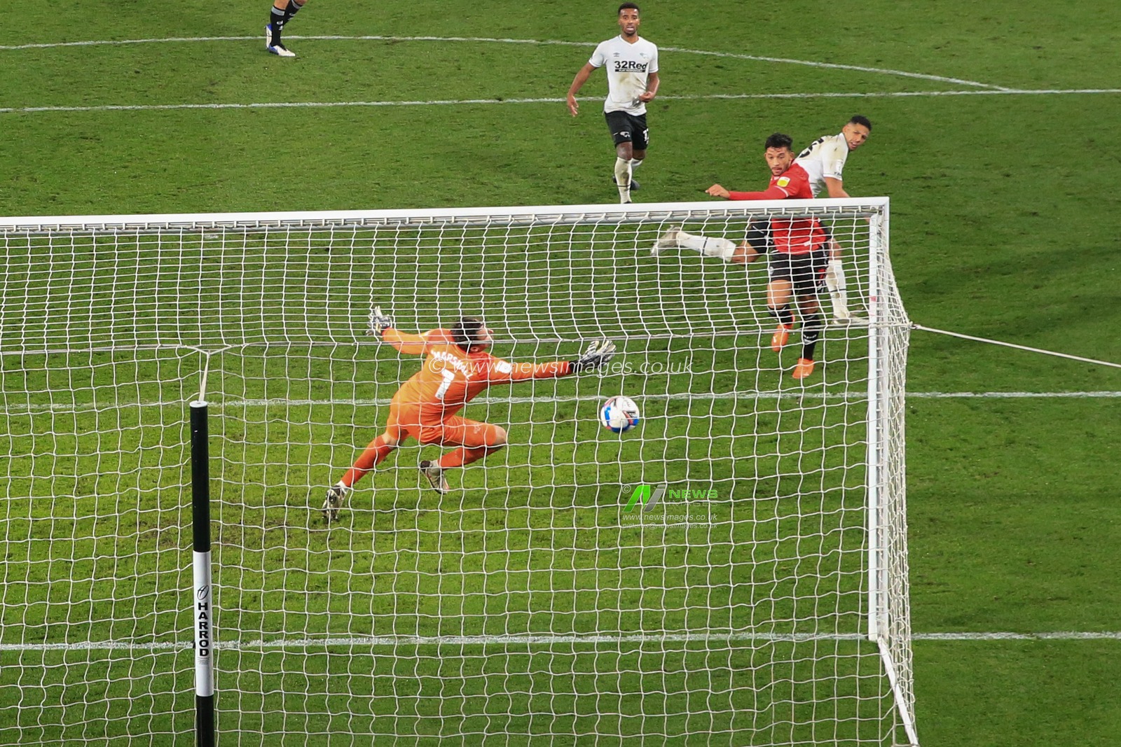 Macauley Bonne (7) of Queens Park Rangers scores to make it 0-1