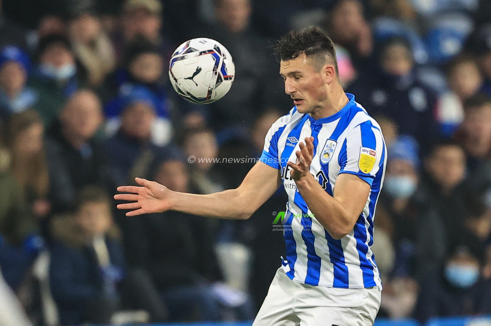 Matty Pearson #4 of Huddersfield Town in action during the game
