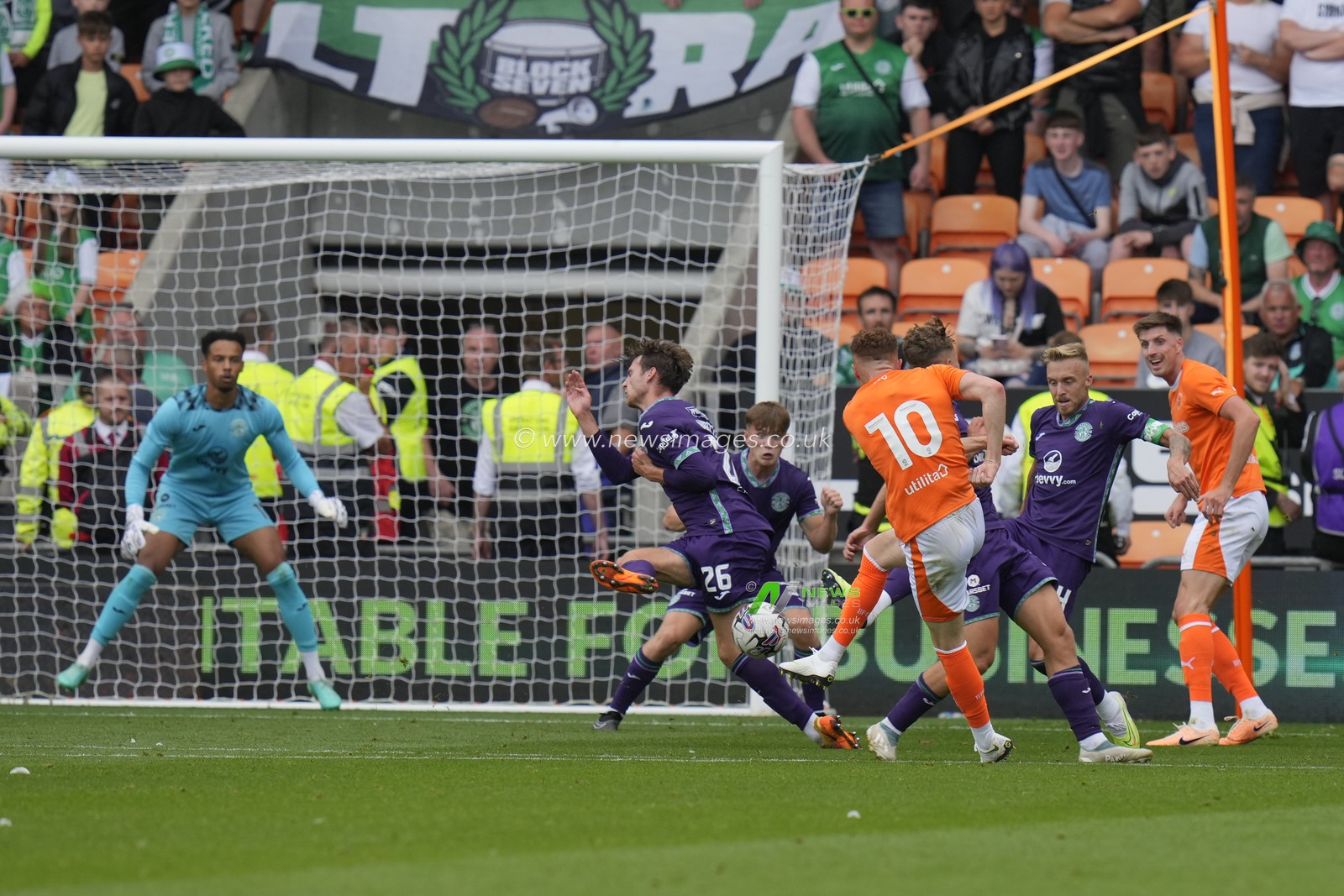Sonny Carey #10 of Blackpool sees his shot blocked by Riley Harbottle #26 of Hibernian during the Pre-season friendly match Blackpool vs Hibernian at Bloomfield Road, Blackpool, United Kingdom, 29th July 2023

(Photo by Steve Flynn/News Images)