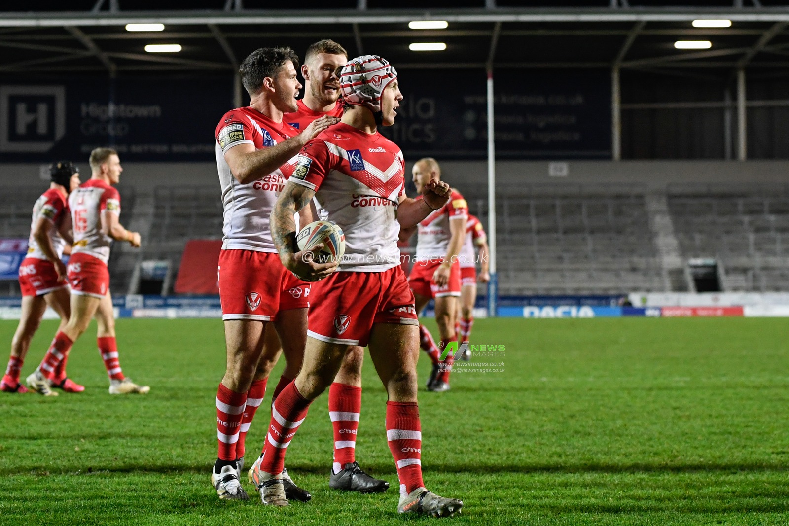 Theo Fages (7) of St Helens celebrates scoring a try
