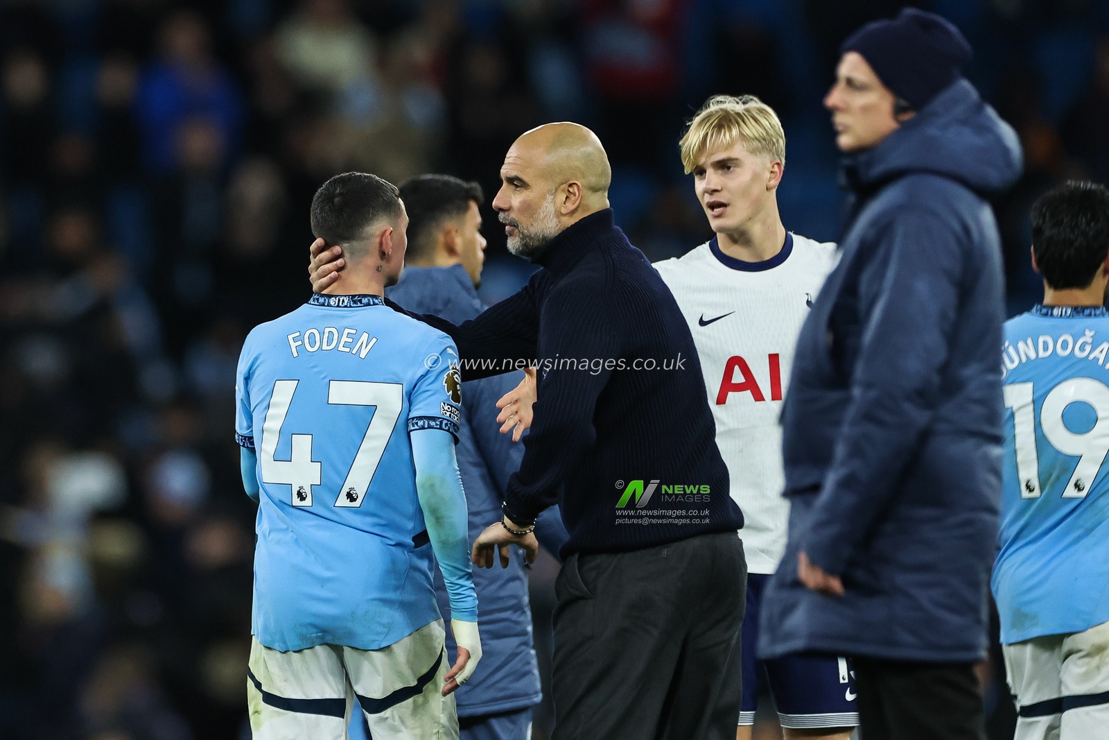 Pep Guardiola manager of Manchester City consoles Phil Foden of Manchester City at the end of the Premier League match Manchester City vs Tottenham Hotspur at Etihad Stadium, Manchester, United Kingdom, 23rd November 2024

(Photo by Mark Cosgrove/News Images)