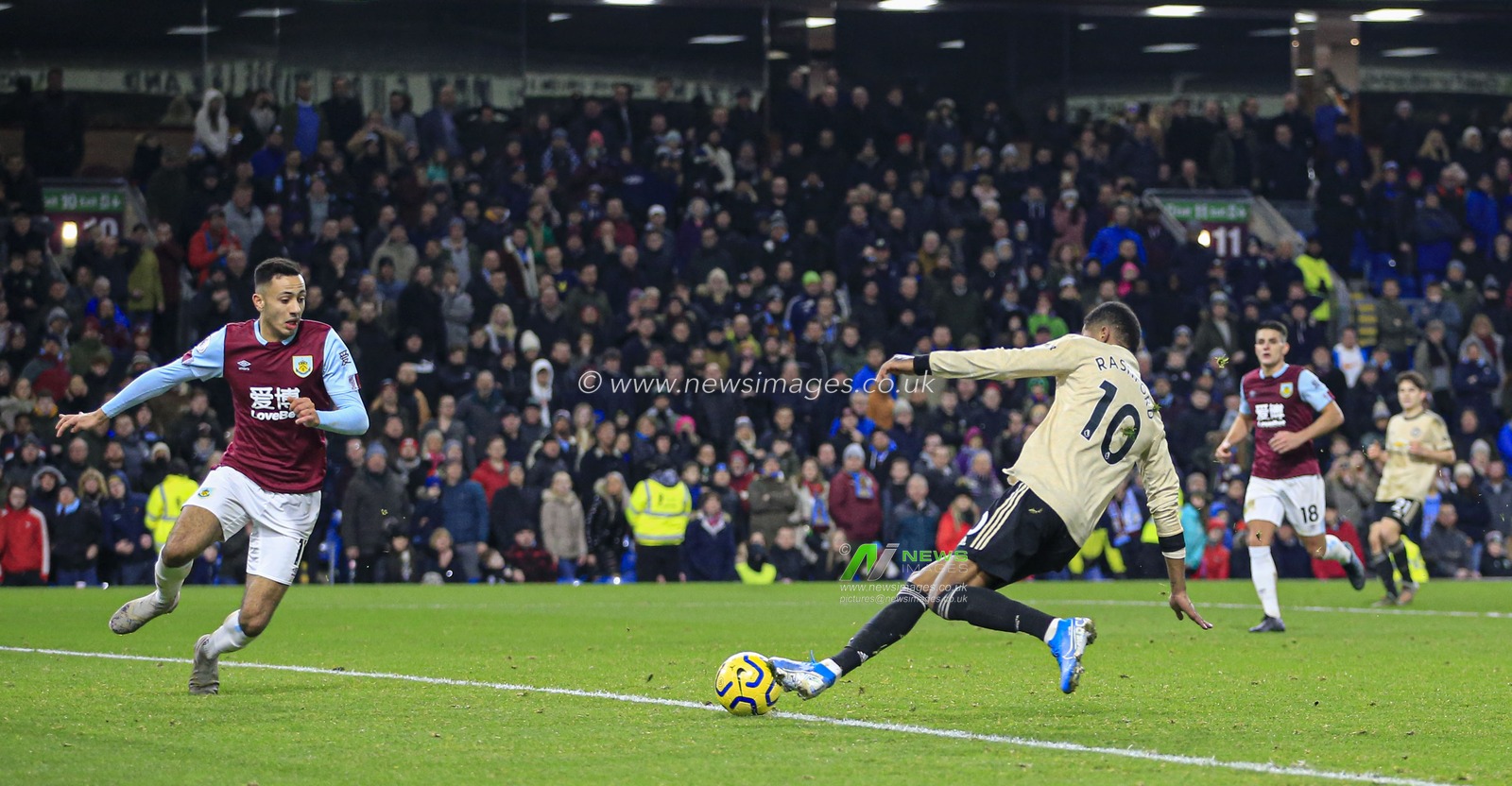 28th December 2019, Turf Moor, Burnley, England; Premier League, Burnley v Manchester United : Marcus Rashford (10) of Manchester United bundles the ball into the net  to score in the 95th minute to make it 0-2 to Manchester United

Credit: Conor Molloy/News Images