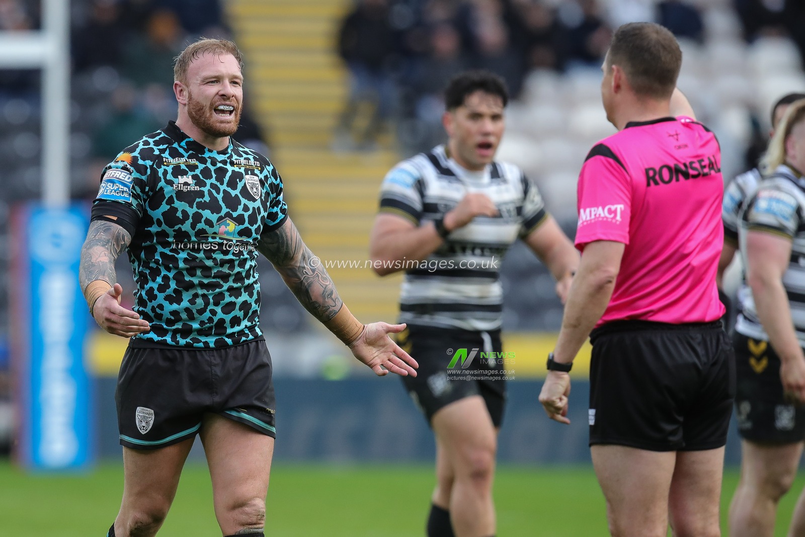 Oliver Holmes #16 of Leigh Leopards complains to Referee Ben Thaler during the Betfred Super League  Round 6 match Hull FC vs Leigh Leopards at MKM Stadium, Hull, United Kingdom, 25th March 2023

(Photo by James Heaton/News Images)