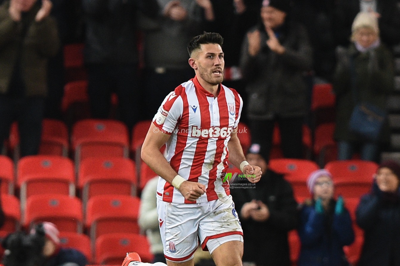 23rd November 2019, Bet365 Stadium, Stoke-on-Trent, England; Sky Bet Championship, Stoke City v Wigan Athletic : Danny Batth (6) of Stoke City celebrates scoring his goal making it 1-1

Credit: Richard Long/News Images