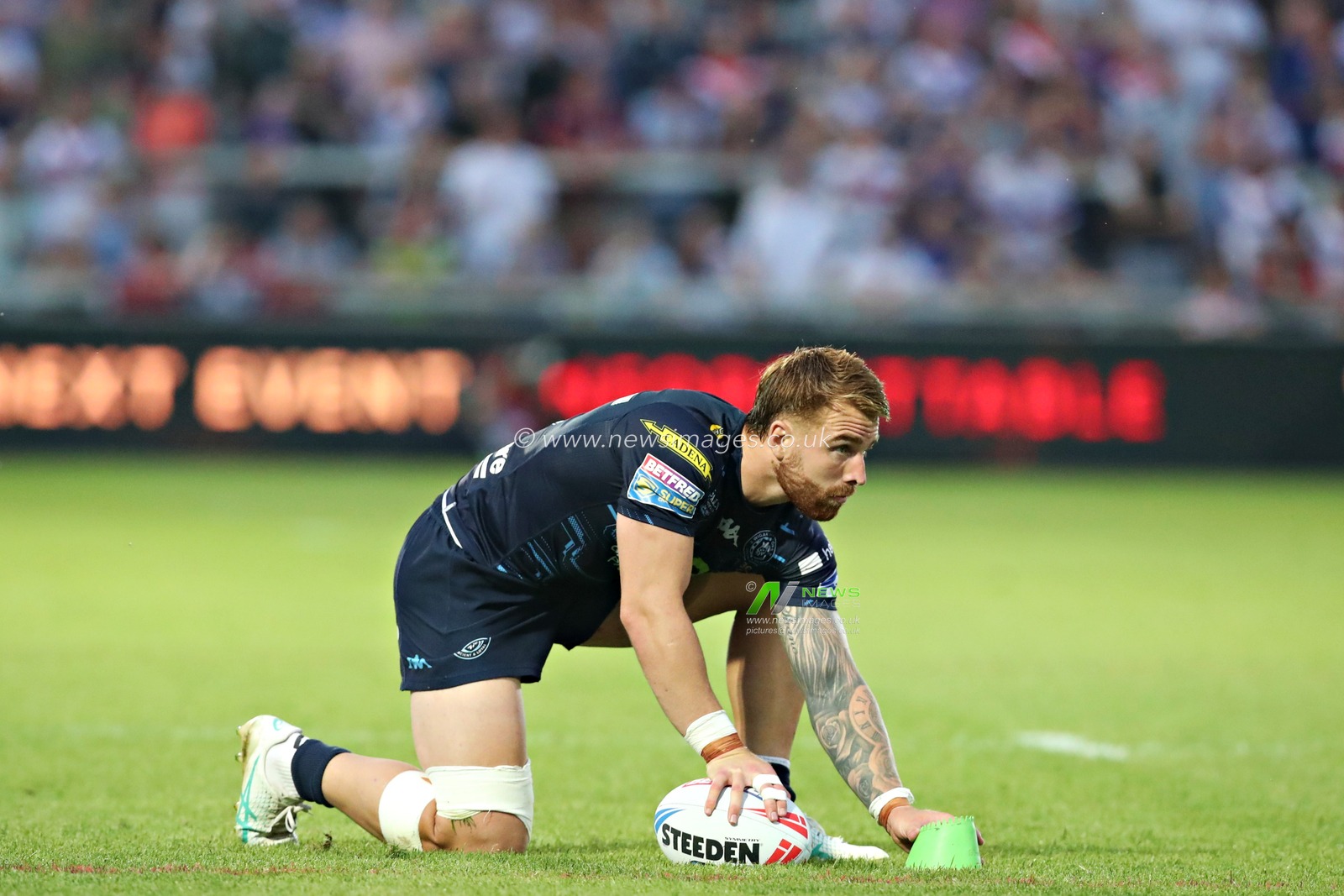 Adam Keighran of Wigan Warriors prepares to take a conversion during the Betfred Super League round 15 match Wakefield Trinity vs Wigan Warriors at DIY Kitchens Stadium, Wakefield, United Kingdom, 20th June 2025(Photo by Sam Eaden/News Images)