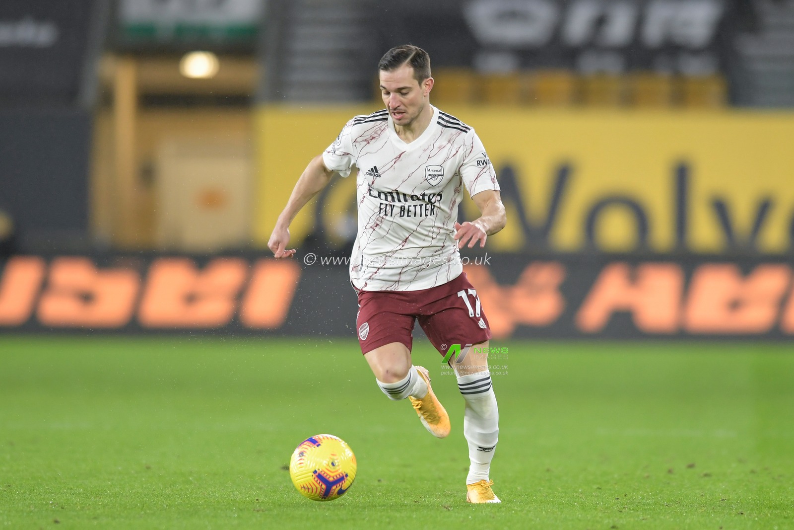 Cedric Soares #17 of Arsenal runs forward with the ball
