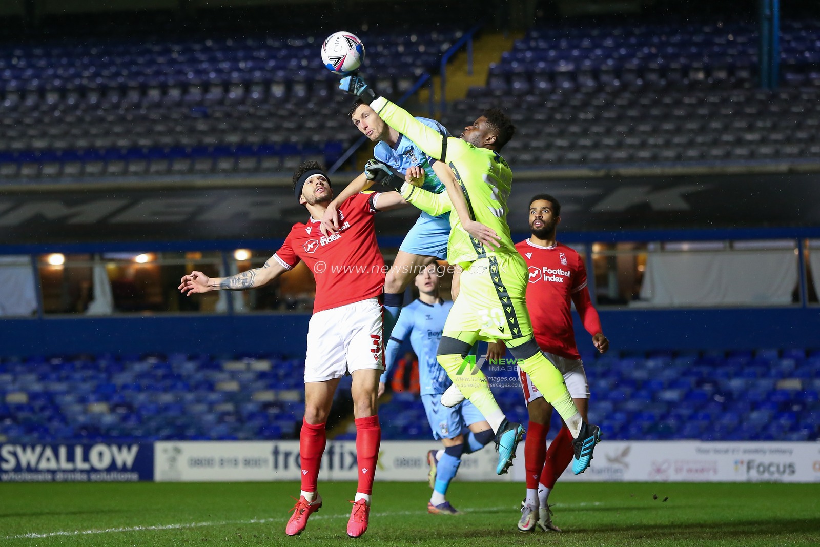 Brice Samba #30 of Nottingham Forest punches the ball clear