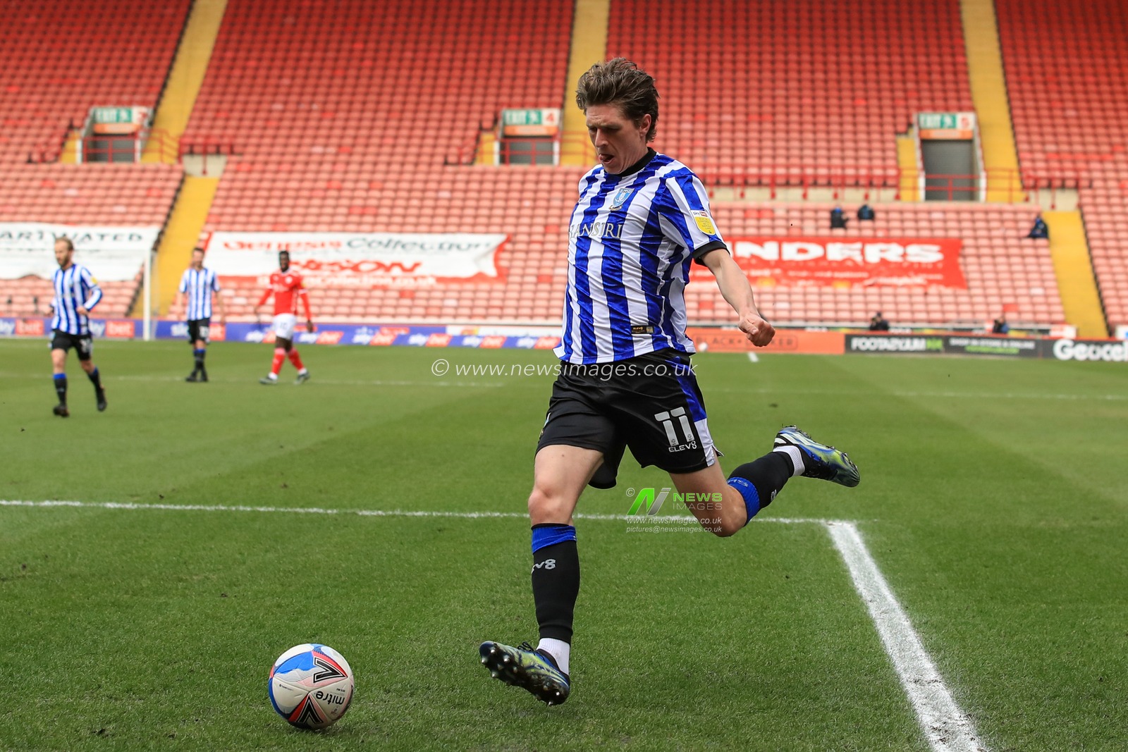 Adam Reach #11 of Sheffield Wednesday looks to cross the ball
