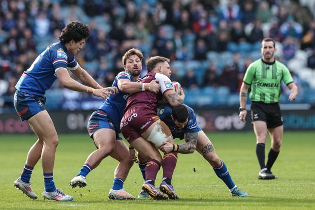 Tristan Powell of Huddersfield Giants is tackled by Tyson Smoothy of Wakefield Trinity during the Betfred Super League Round 2 match Huddersfield Giants vs Wakefield Trinity at Accu Stadium, Huddersfield, United Kingdom on 22 February 2026

(Photo by Mark Cosgrove/News Images)