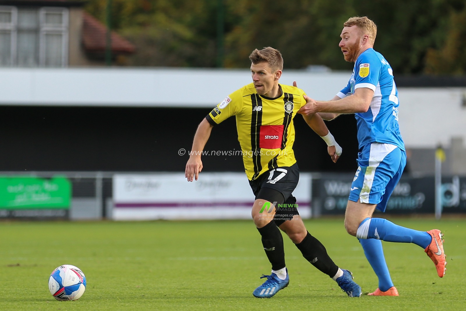 Lloyd Kerry (17) of Harrogate Town in action during the game