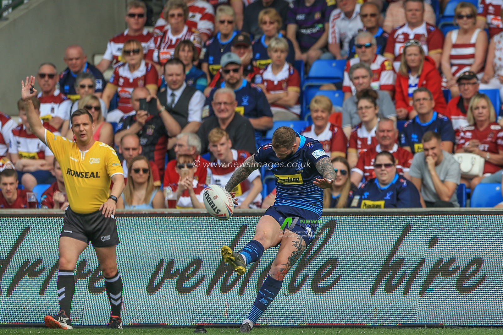 19th April  2019 , DW Stadium, Wigan, England;  Betfred Super League, Round 11, Wigan Warriors vs St Helens ; Zak Hardaker (20) of Wigan Warriors converts 

Credit: Mark Cosgrove/News Images
