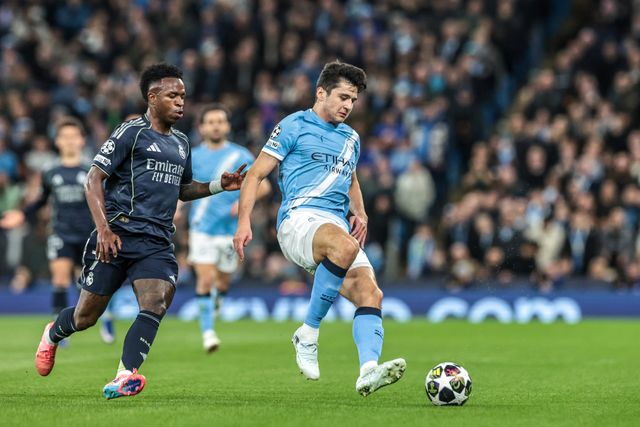 Vinicius Junior of Real Madrid and Abdukodir Khusanov of Manchester City battle for the ball during the UEFA Champions League last 16 second leg match Manchester City vs Real Madrid at The City of Manchester Stadium, Manchester, United Kingdom on 17 March 2026

(Photo by Mark Cosgrove/News Images)