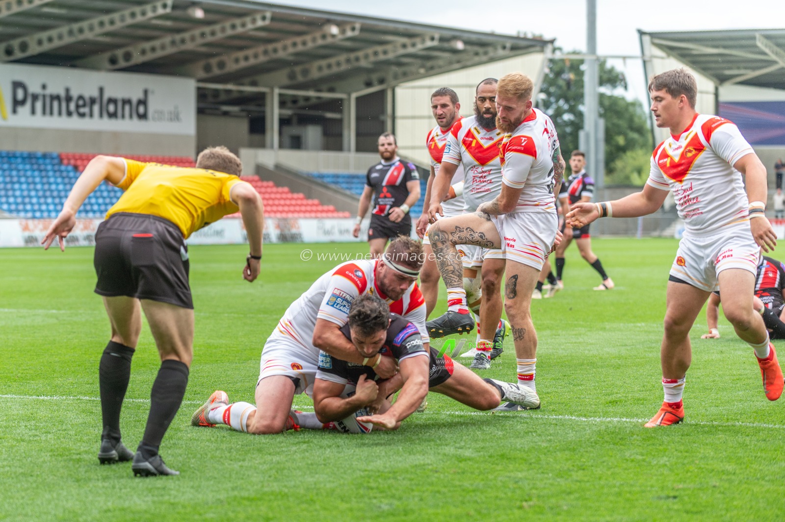 21st July 2019 ,  AJ Bell Stadium, Salford, England;  Betfred Super League, Round 23, Salford Red Devils vs Catalans Dragons ; Mark Flanagan (13) of Salford Red Devils powers over for a try

Credit: Richard Long/News Images