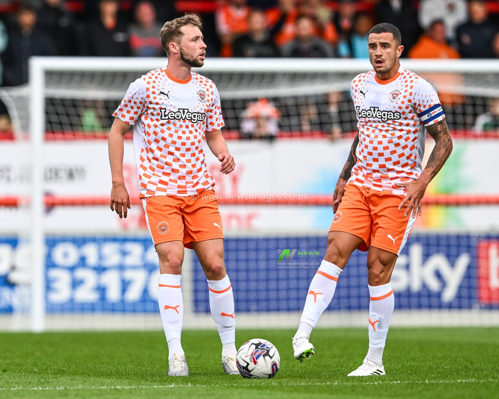 Matthew Pennington #5 and Oliver Norburn #6 of Blackpool during the Pre-season friendly match Morecambe vs Blackpool at Mazuma Stadium, Morecambe, United Kingdom, 25th July 2023

(Photo by Craig Thomas/News Images)