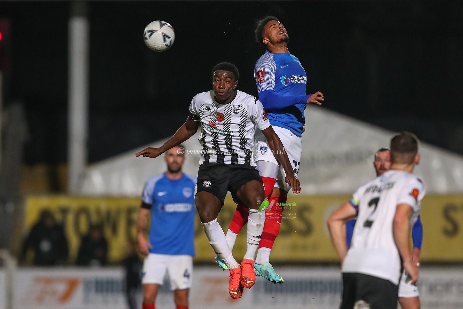 Jethro Hanson #15 of Hereford and Josh Koroma #27 of Portsmouth battle for the ball during the Emirates FA Cup First Round match Hereford FC vs Portsmouth at Edgar Street, Hereford, United Kingdom, 4th November 2022

(Photo by Gareth Evans/News Images)