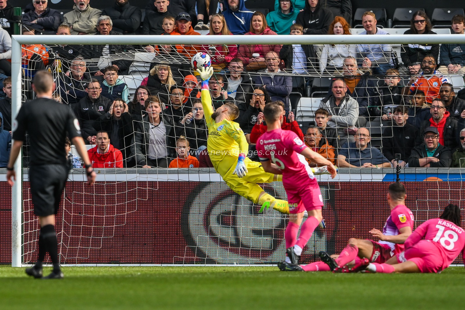 Jonathan Hogg #6 of Huddersfield Town deflects the ball into his own net to make the score 1-0 during the Sky Bet Championship match Swansea City vs Huddersfield Town at Swansea.com Stadium, Swansea, United Kingdom, 15th April 2023

(Photo by Craig Thomas/News Images)