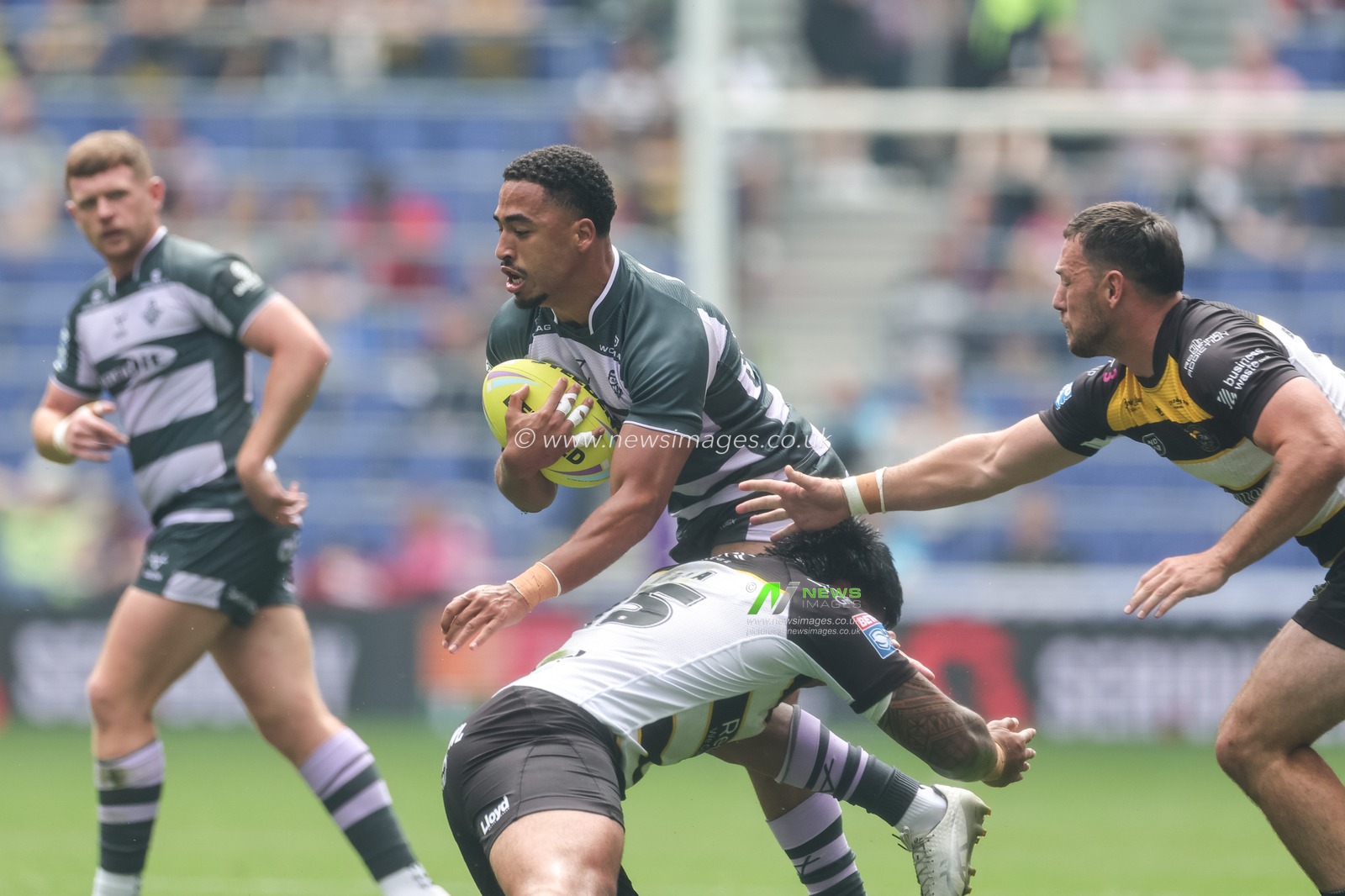 Tanguy Zenon of Huddersfield Giants is tackled by Xavier Va'a of York Knights during the Betfred Super League Magic Weekend match Huddersfield Giants vs York Knights at Hill Dickinson Stadium, Liverpool, United Kingdom on 04 July 2026

(Photo by Mark Cosgrove/News Images)