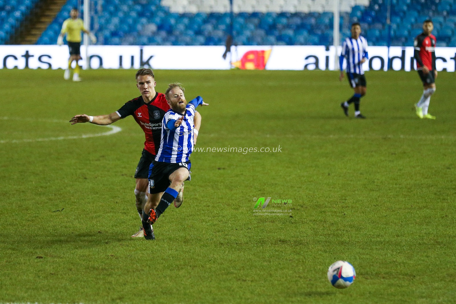 Barry Bannan #10 of Sheffield Wednesday is fouled by Leo Ã˜stigÃ¥rd #2 of Coventry City