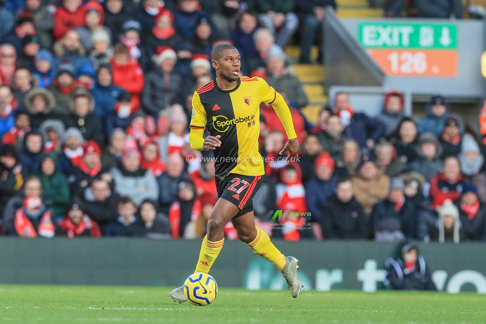 14th December 2019, Anfield, Liverpool, England; Premier League, Liverpool v Watford :  Christian Kabasele (27) of Watford with the ball 

Credit: Mark Cosgrove/News Images