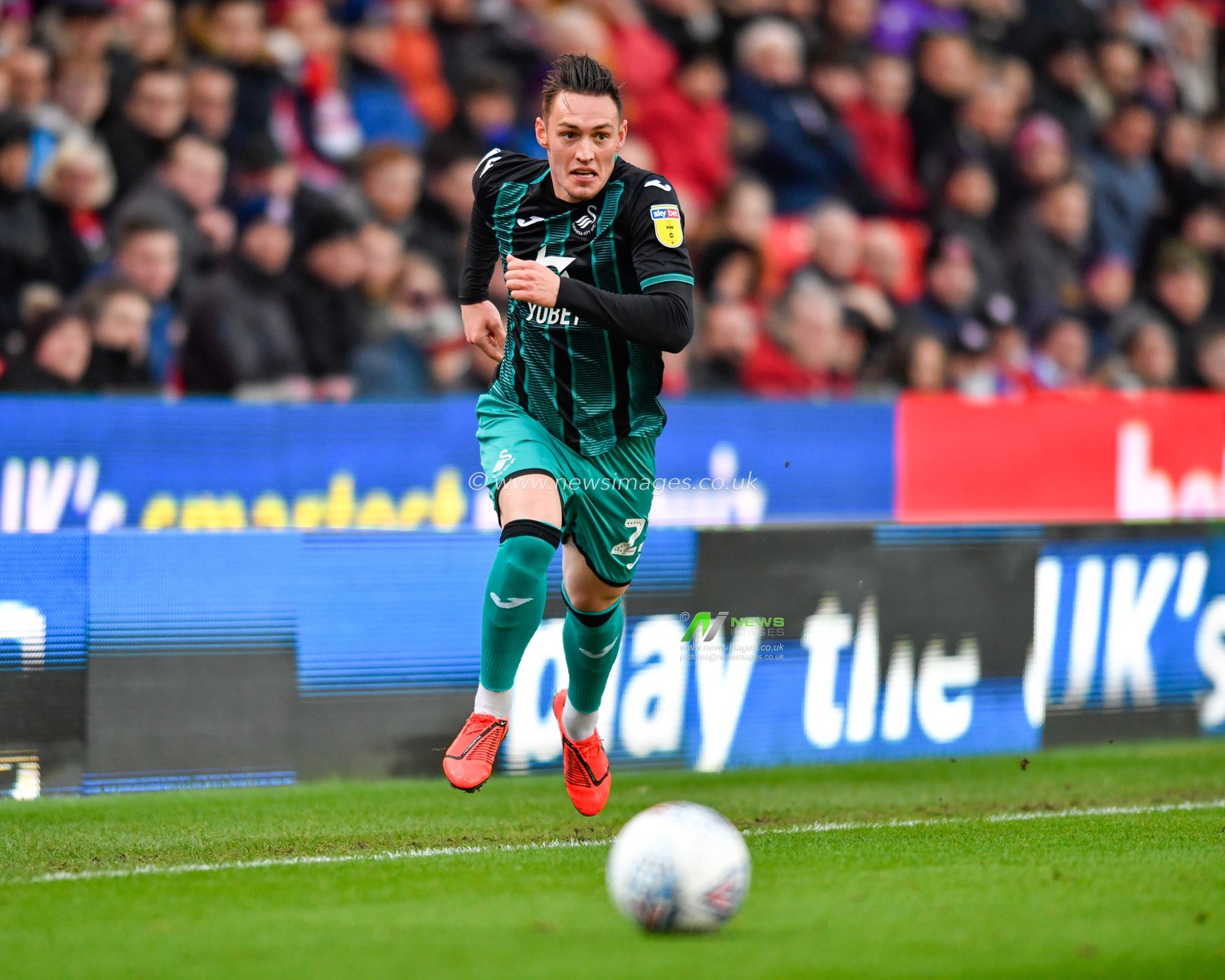 25th January 2020, Bet365 Stadium, Stoke-on-Trent, England; Sky Bet Championship, Stoke City v Swansea City : Connor Roberts (23) of Swansea City runs forward with the ball