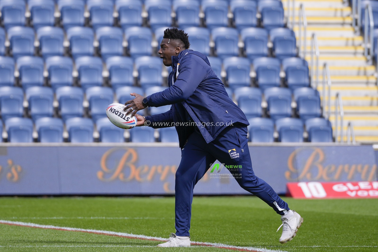Justin Sangare #17 of Leeds Rhinos passes a ball as he inspects the pitch before the Betfred Super League Round 6 match Leeds Rhinos vs Catalans Dragons at Headingley Stadium, Leeds, United Kingdom, 25th March 2023

(Photo by Steve Flynn/News Images)