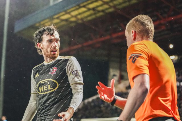 Exeter City Midfielder Ed Francis arguing with Graeme Fyvie during the Sky Bet League 1 match Stockport County vs Exeter City at Edgeley Park Stadium, Stockport, United Kingdom, 7th December 2024

(Photo by James Giblin/News Images)