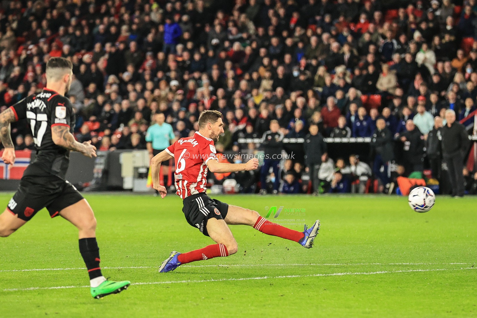 Chris Basham #6 of Sheffield United shoos at goal, over the bar