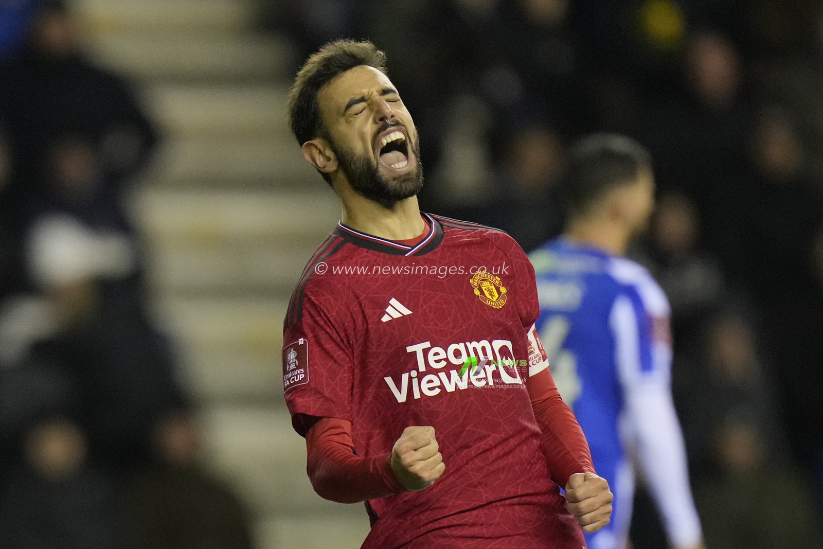 Bruno Fernandes of Manchester United celebrates after he scores a goal to make it 0-2 during the Emirates FA Cup Third Round match Wigan Athletic vs Manchester United at DW Stadium, Wigan, United Kingdom, 8th January 2024

(Photo by Steve Flynn/News Images)