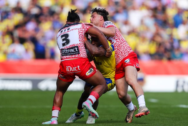 Rodrick Tai of Warrington Wolves is tackled by Tesi Niu of Leigh Leopards and Lachlan Lam of Leigh Leopards during the Betfred Challenge Cup Semi-final match Warrington Wolves vs Leigh Leopards at Totally Wicked Stadium, St Helens, United Kingdom, 11th May 2025

(Photo by Gareth Evans/News Images)