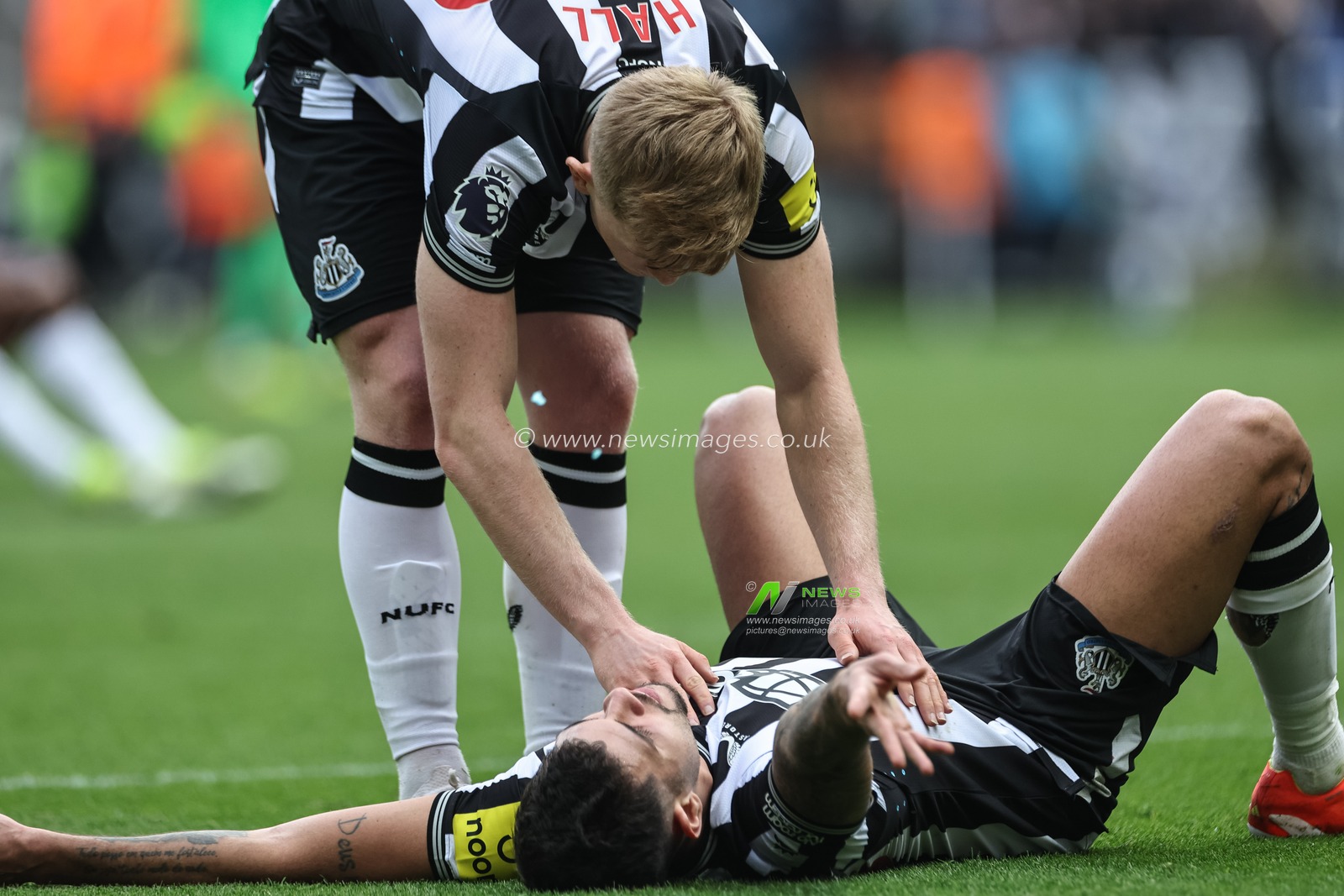 Lewis Hall of Newcastle United chess on Bruno GuimarÃ£es of Newcastle United after the final whistle during the Premier League match Newcastle United vs West Ham United at St. James's Park, Newcastle, United Kingdom, 30th March 2024

(Photo by Mark Cosgrove/News Images)