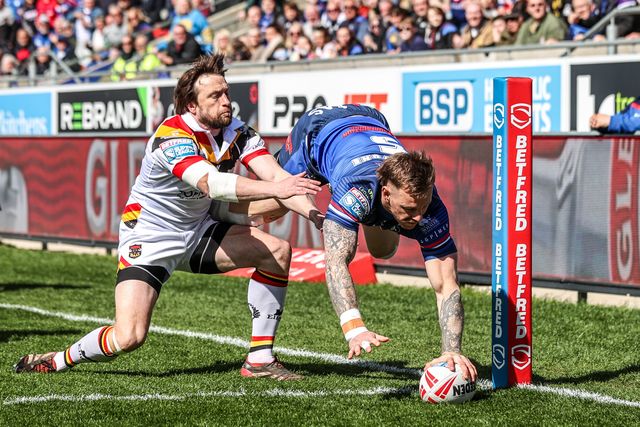 Tom Johnstone of Wakefield Trinity goes over for a try during the Betfred Super League round 8 match Wakefield Trinity vs Bradford Bulls at DIY Kitchens Stadium, Wakefield, United Kingdom on 18 April 2026

(Photo by Alfie Cosgrove/News Images)