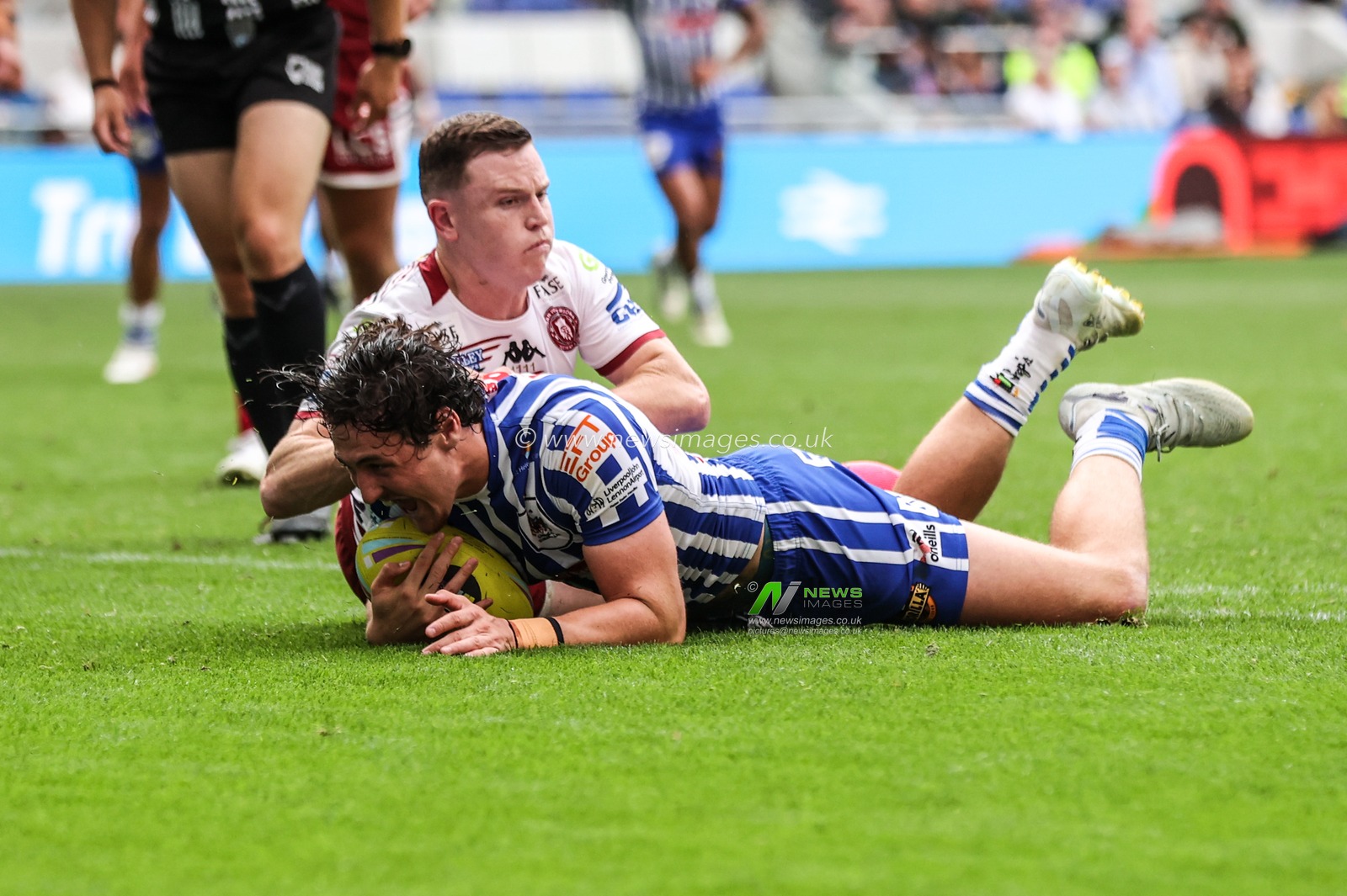 Jake Davies of St Helens goes over for a try during the Betfred Super League Magic Weekend match Wigan Warriors vs St Helens at Hill Dickinson Stadium, Liverpool, United Kingdom on 05 July 2026

(Photo by Alfie Cosgrove/News Images)