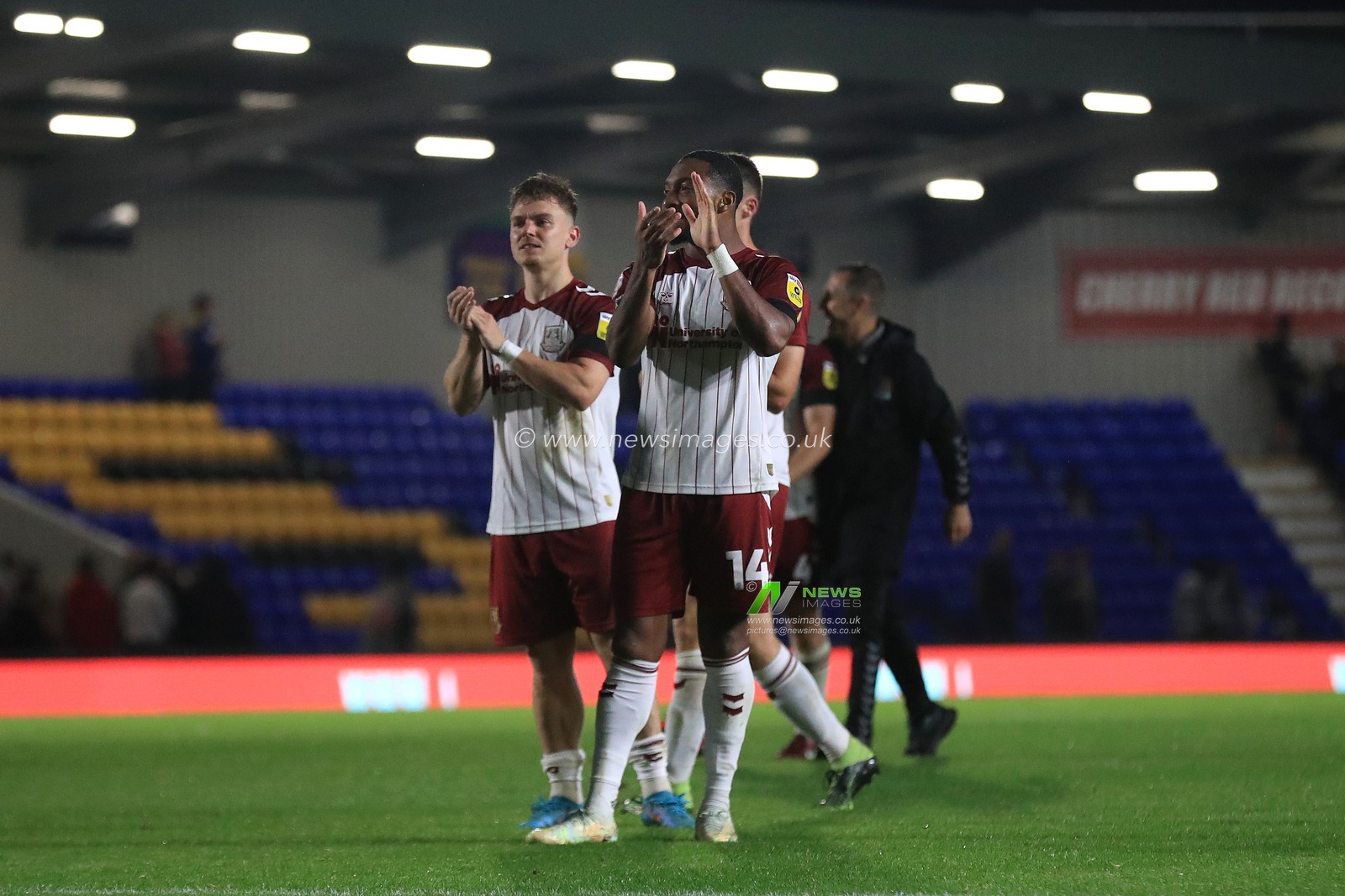 Adb-Al-Alli Morakinyo Koiki #14 of Northampton Town applauds fans during the Sky Bet League 2 match AFC Wimbledon vs Northampton Town at Cherry Red Records Stadium, Merton, United Kingdom, 13th September 2022

(Photo by Carlton Myrie/News Images)