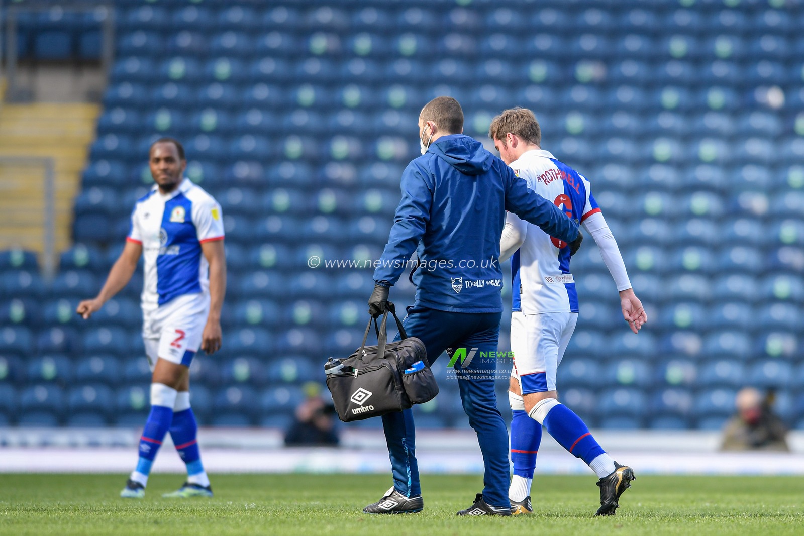 Joe Rothwell #8 of Blackburn Rovers leaves the pitch after picking up an injury