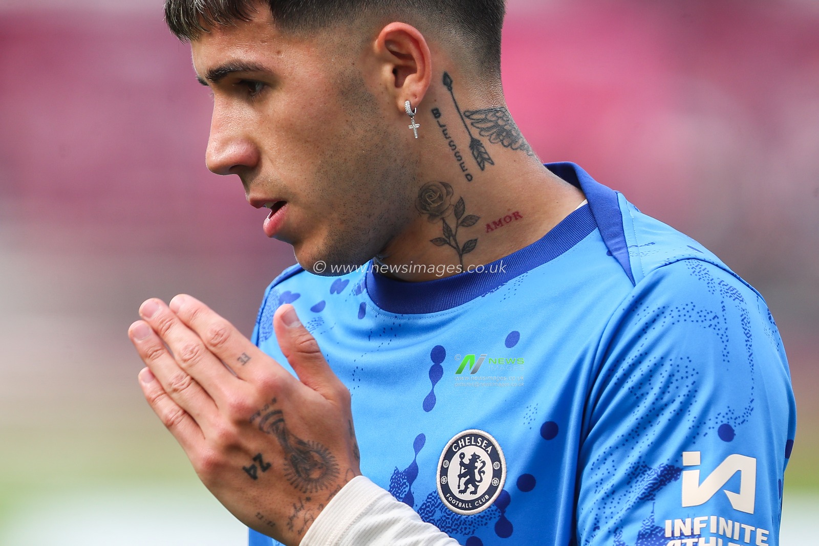 The neck tattoos of Enzo FernÃ¡ndez of Chelsea during the Premier League match West Ham United vs Chelsea at London Stadium, London, United Kingdom, 21st September 2024

(Photo by Gareth Evans/News Images)