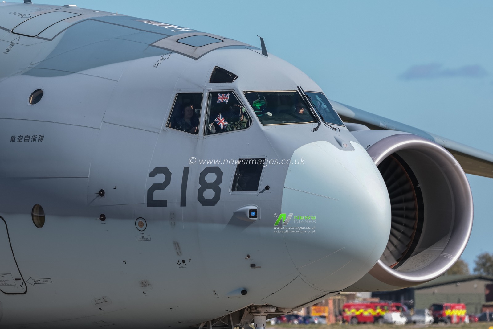 A pilot waves a Union Jack Flag as a Kawasaki C-2 transporter leaves.  The Japan Air Self-Defense Force (JASDF) has successfully competes the first fighter aircraft deployment to Europe in its 71-year history, as they join the United Kingdomâ€™s Royal Air Force as they arrive at RAF Coningsby as part of the "Atlantic Eagles" mission. This landmark achievement strengthens defence cooperation between the United Kingdom and Japan whilst demonstrating the interconnected nature of global security at RAF Coningsby, Coningsby, United Kingdom, 22nd September 2025

(Photo by Mark Cosgrove/News Images)