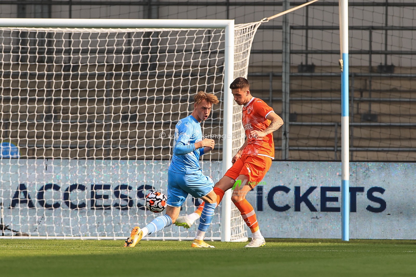 Oliver Sarkic of Blackpool clears the ball from the goal line