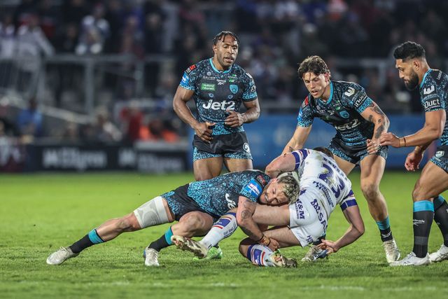 Josh Rourke of Wakefield Trinity is tackled by Ethan O'neill of Leigh Leopards during the Betfred Challenge Cup Quarter Final match Wakefield Trinity vs Leigh Leopards at DIY Kitchens Stadium, Wakefield, United Kingdom, 4th April 2025

(Photo by Alfie Cosgrove/News Images)