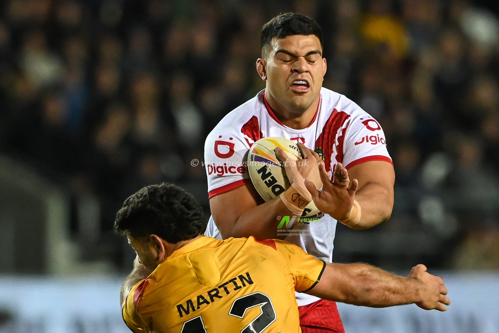 David Fifita of Tongais tackled by Rhyse Martin of Papua New Guinea  during the Rugby League World Cup 2021 match Tonga vs Papua New Guinea at Totally Wicked Stadium, St Helens, United Kingdom, 18th October 2022

(Photo by Craig Thomas/News Images)
