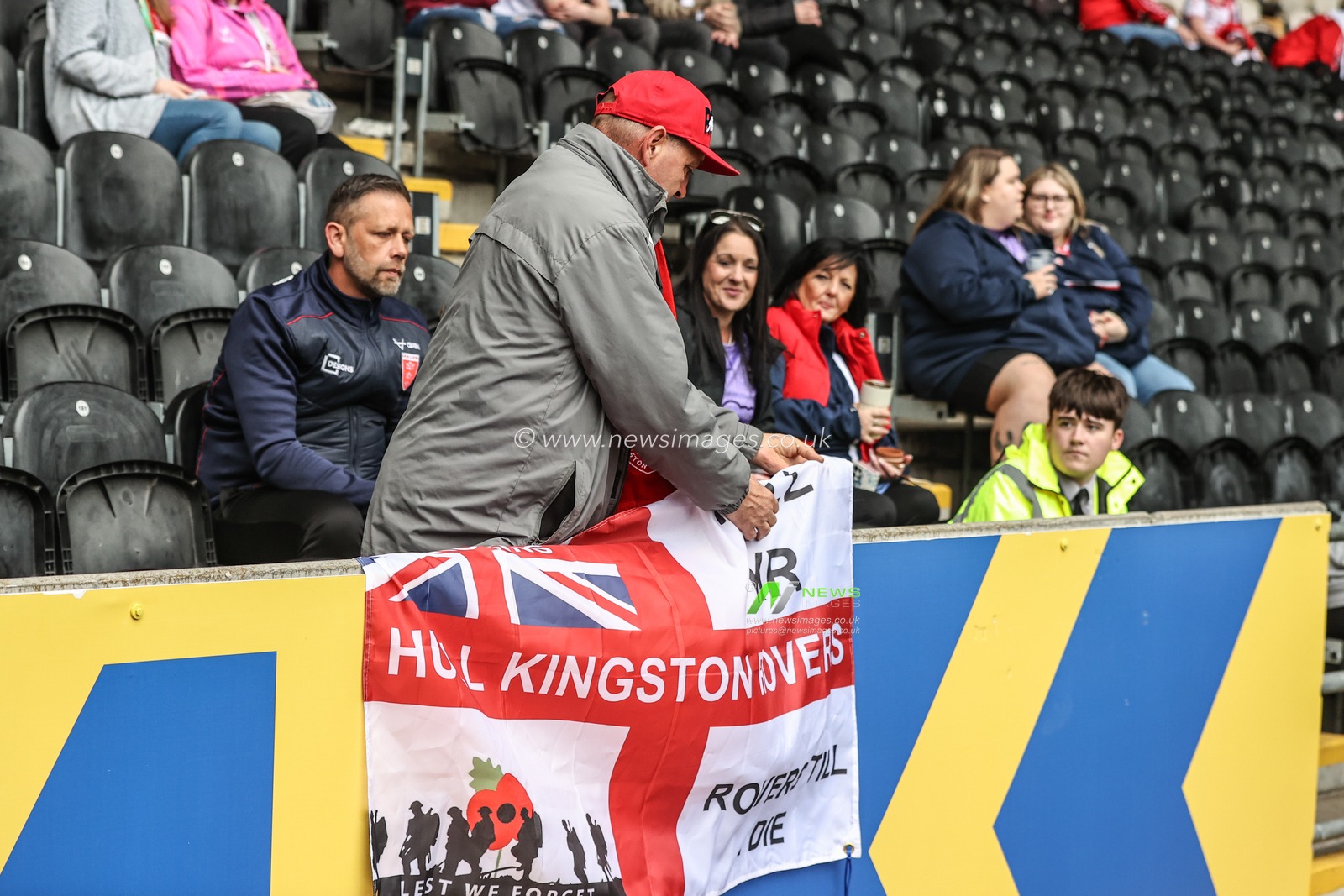 A Hull KR fan puts up a flag during the Betfred Super League Round 8 match Hull FC vs Hull KR at MKM Stadium, Hull, United Kingdom, 18th April 2025

(Photo by Alfie Cosgrove/News Images)