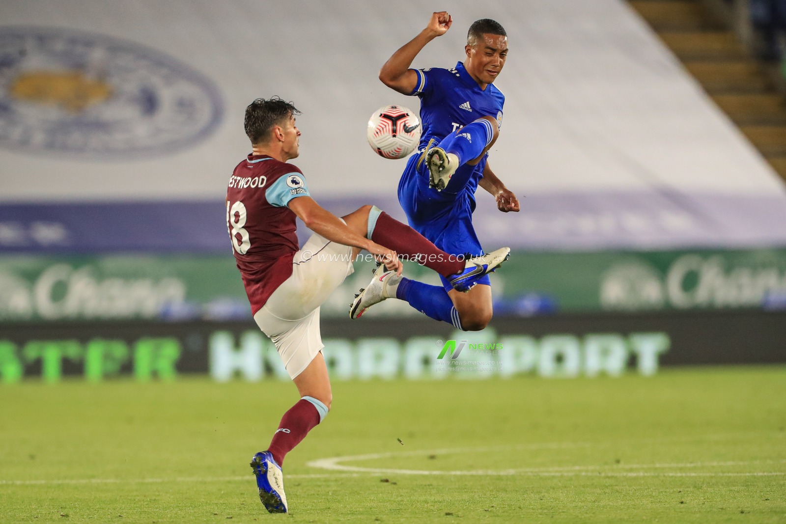 Youri Tielemans (8) of Leicester City and Ashley Westwood (18) of Burnley battle for the ball