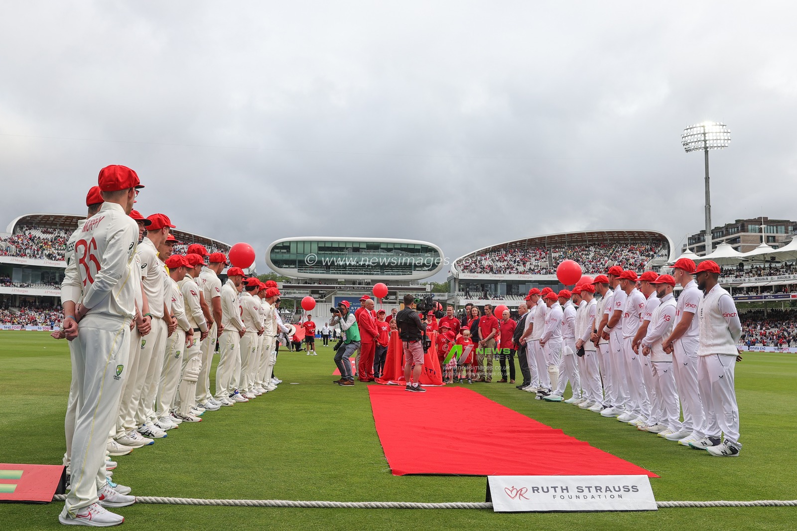 Both teams line up for the Red for Ruth foundation ceremony during the LV= Insurance Ashes Test Series Second Test Day 2 England v Australia at Lords, London, United Kingdom, 29th June 2023

(Photo by Mark Cosgrove/News Images)
