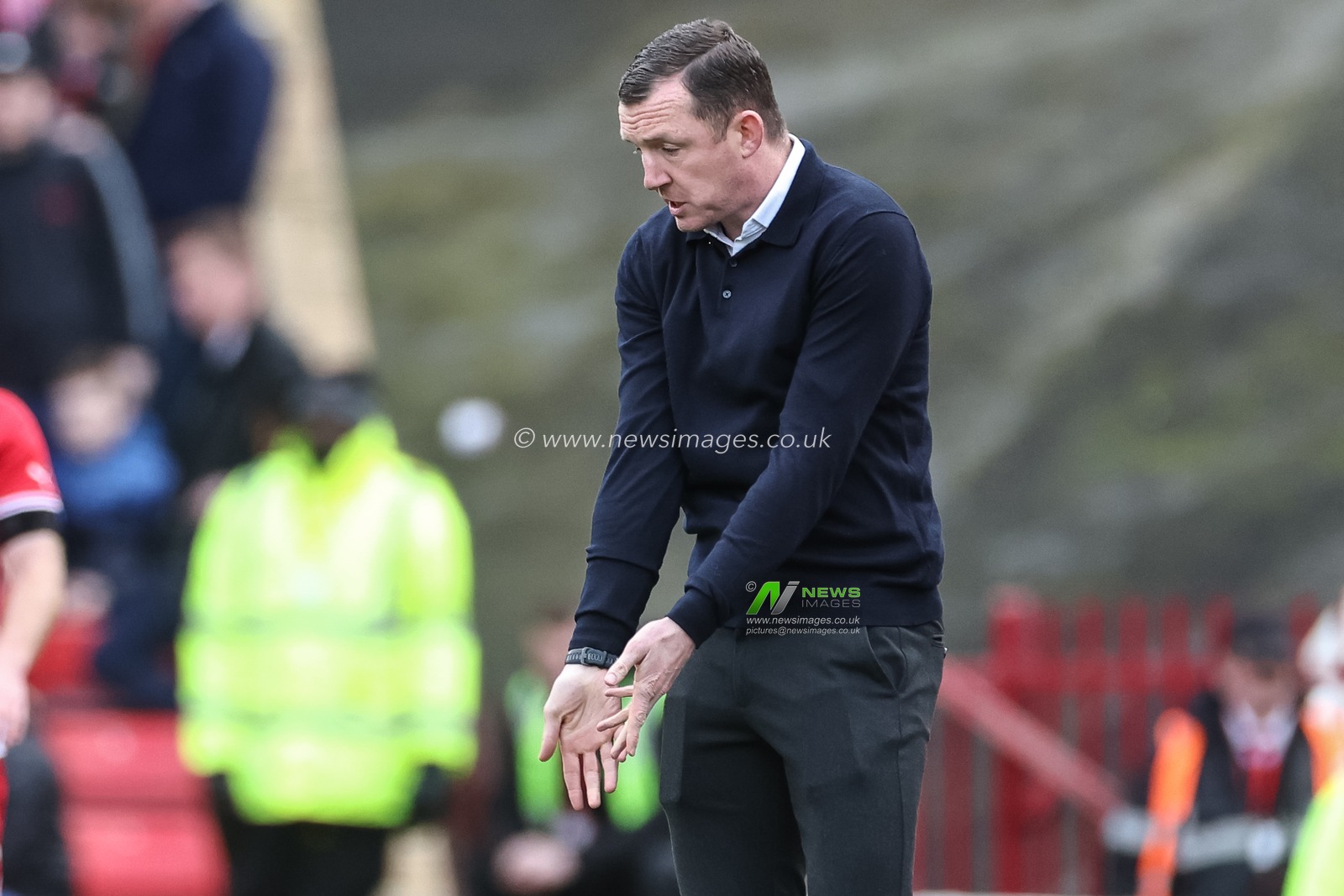 Neill Collins Head coach of Barnsley reacts in the technical area during the Sky Bet League 1 match Barnsley vs Cambridge United at Oakwell, Barnsley, United Kingdom, 29th March 2024

(Photo by Mark Cosgrove/News Images)