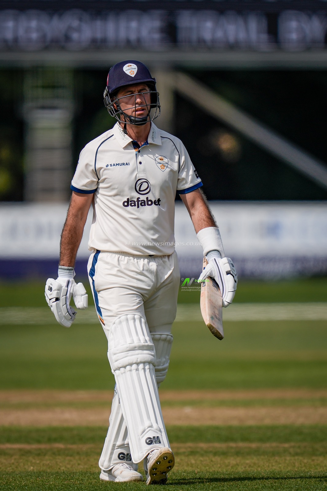 Dejected Wayne Madsen walks off after being caught by Ed Middleton off the bowling of Will Williams during the County Championship Division Two Derbyshire v Gloucestershire at The Central Co-Op County Ground, Derby, United Kingdom on 26 April 2026

(Photo by Maynard Manyowa/News Images)