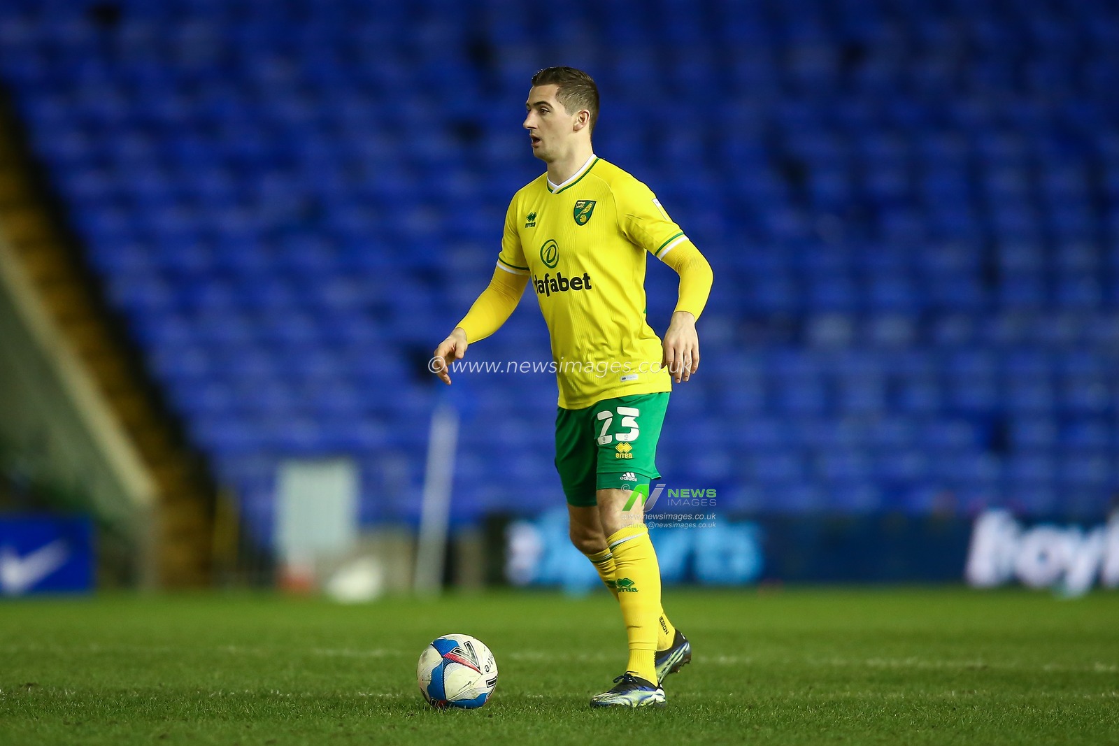 Kenny McLean #23 of Norwich City dribbles the ball