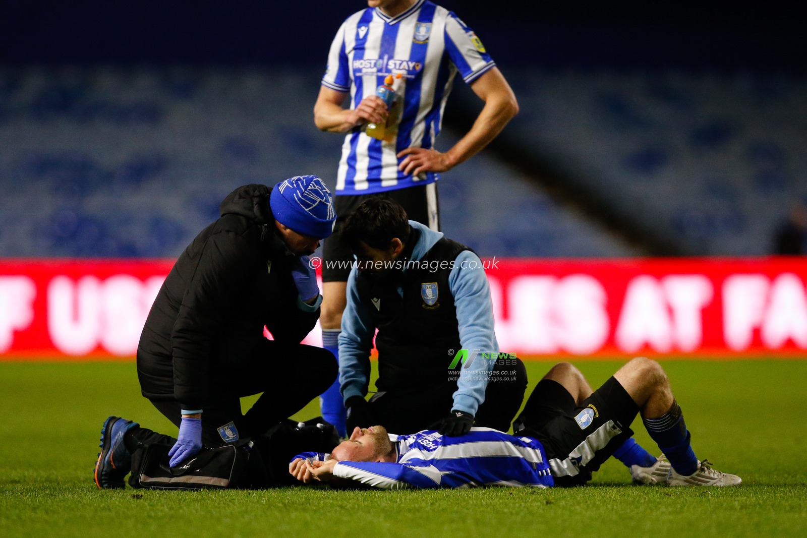 Barry Bannan #10 of Sheffield Wednesday receives treatment on the pitch during the Sky Bet League 1 match Sheffield Wednesday vs Port Vale at Hillsborough, Sheffield, United Kingdom, 29th December 2022

(Photo by Ben Early/News Images)